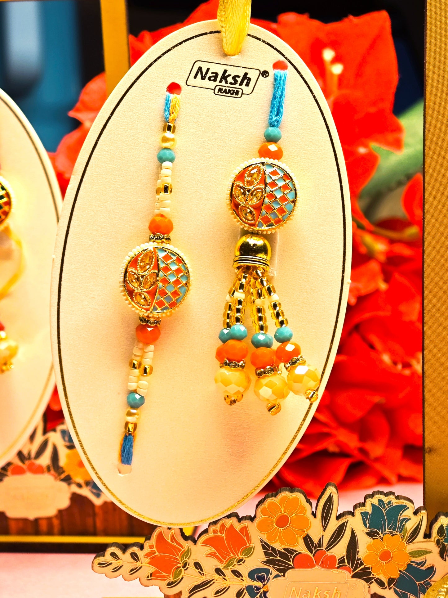 Bhai Bhabhi Rakhi Set – Traditional Designer Rakhi Pair (Red-Green and Orange-Blue Variants)