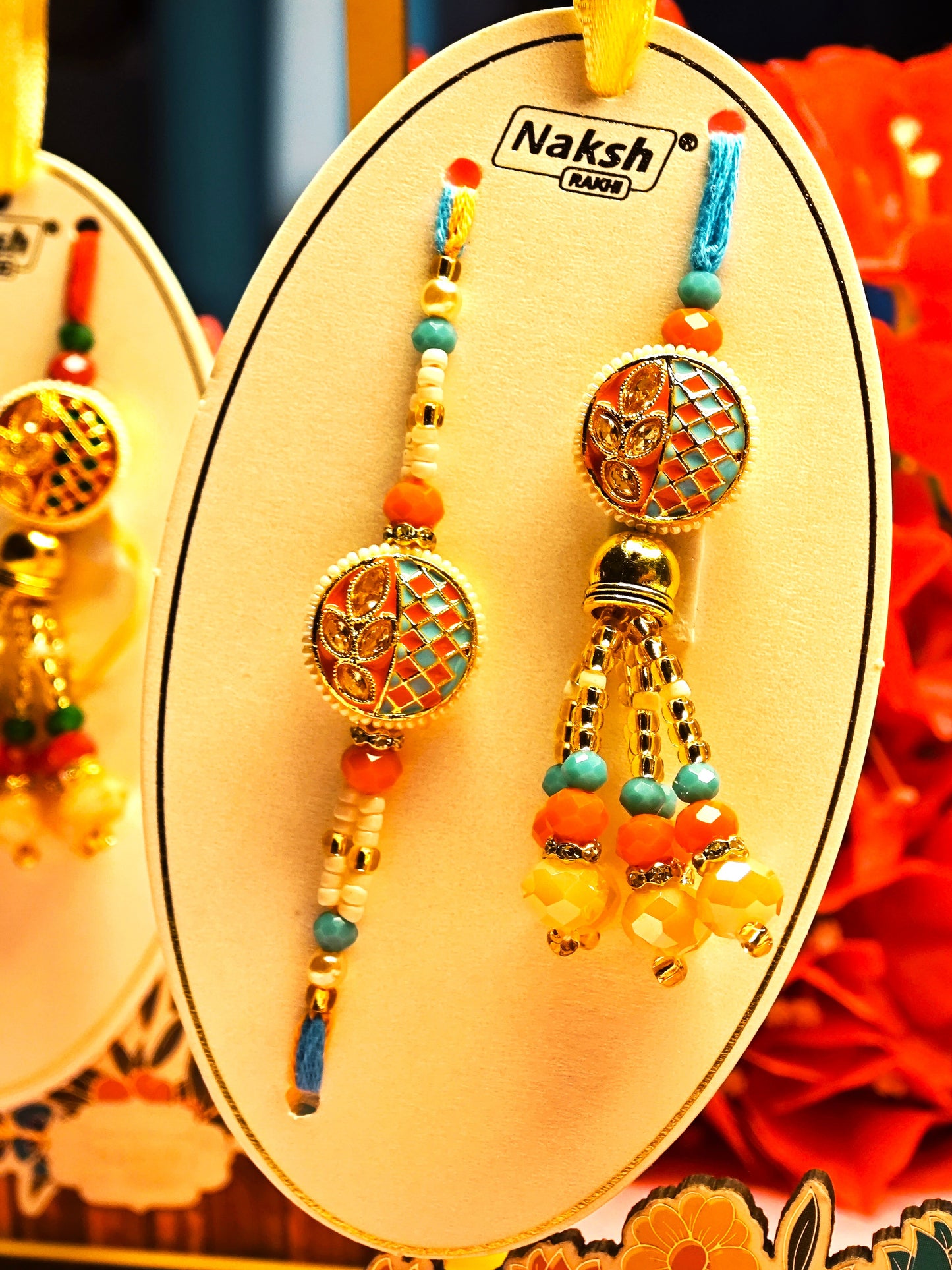 Bhai Bhabhi Rakhi Set – Traditional Designer Rakhi Pair (Red-Green and Orange-Blue Variants)