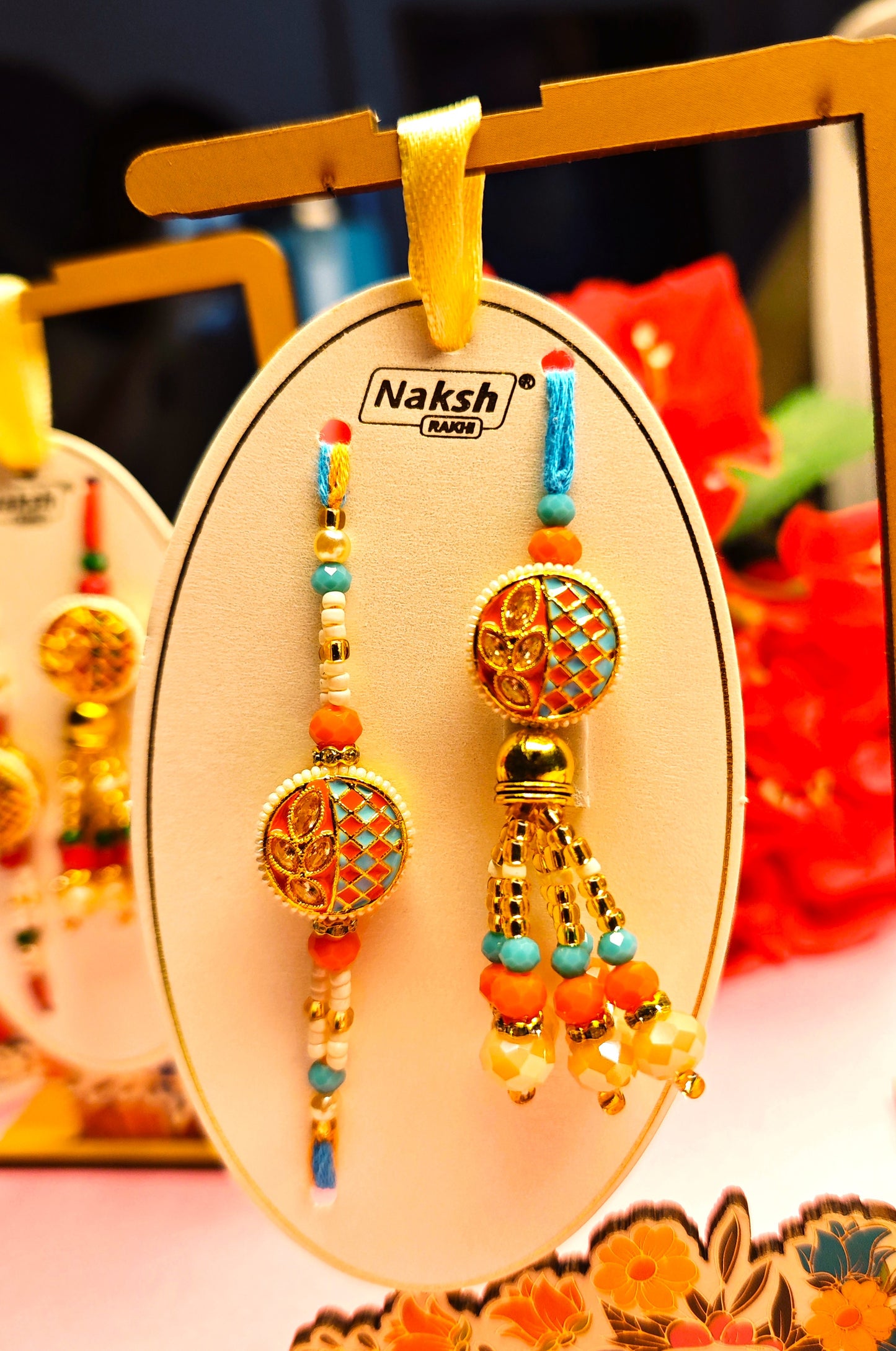 Bhai Bhabhi Rakhi Set – Traditional Designer Rakhi Pair (Red-Green and Orange-Blue Variants)