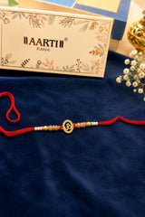 AD sleek Om Rakhi