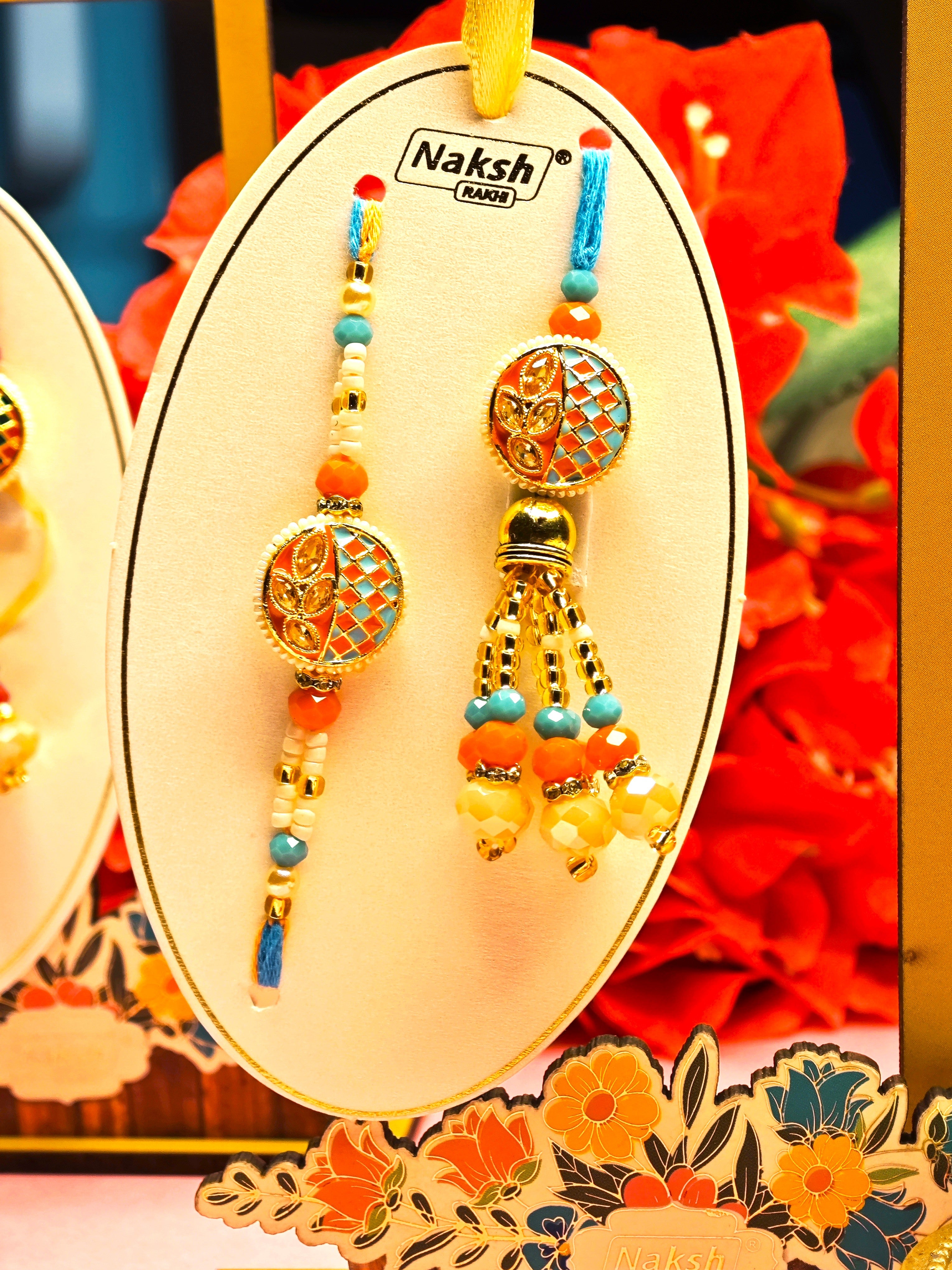 Bhai Bhabhi Rakhi Set – Traditional Designer Rakhi Pair (Red-Green and Orange-Blue Variants)