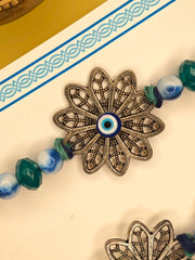 Mystik Nazar Floral Rakhi with Leaf Charm; Bhai Bhabhi Rakhi