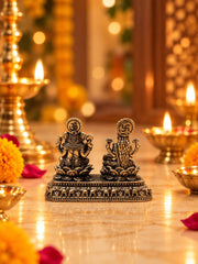 Antique Finish Lakshmi–Ganesha Idol Set with Ornate Elephant Motif Base