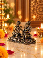 Antique Finish Lakshmi–Ganesha Idol Set with Ornate Elephant Motif Base