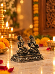 Antique Finish Lakshmi–Ganesha Idol Set with Ornate Elephant Motif Base